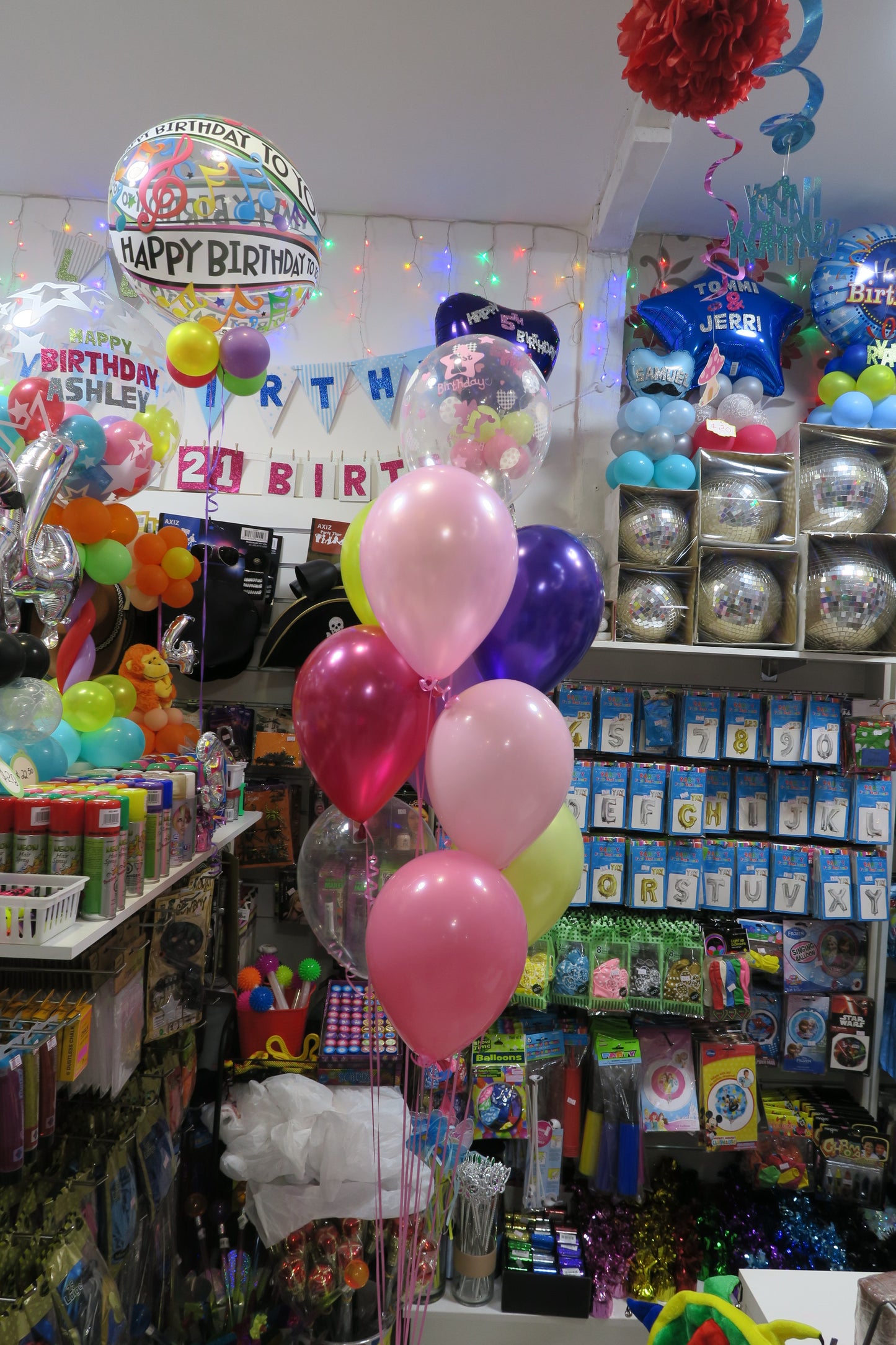 60th Pink Bubble and 9 helium Balloon Bouquet