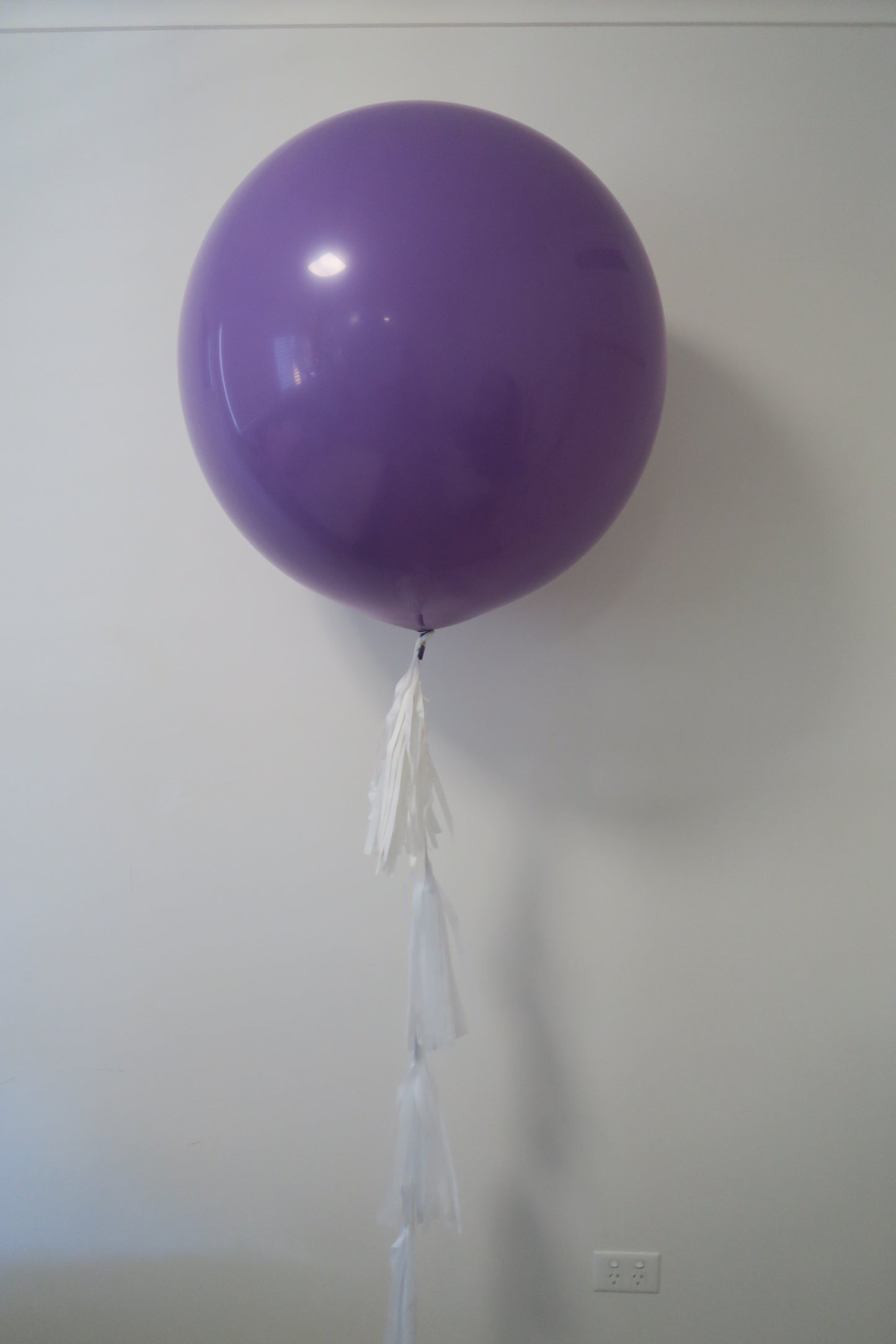3ft round balloon with tassel arrangement