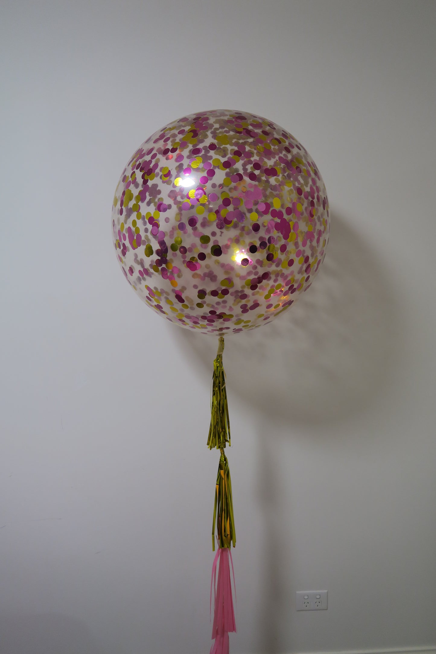 3ft clear gold, magenta and pink  confetti balloon