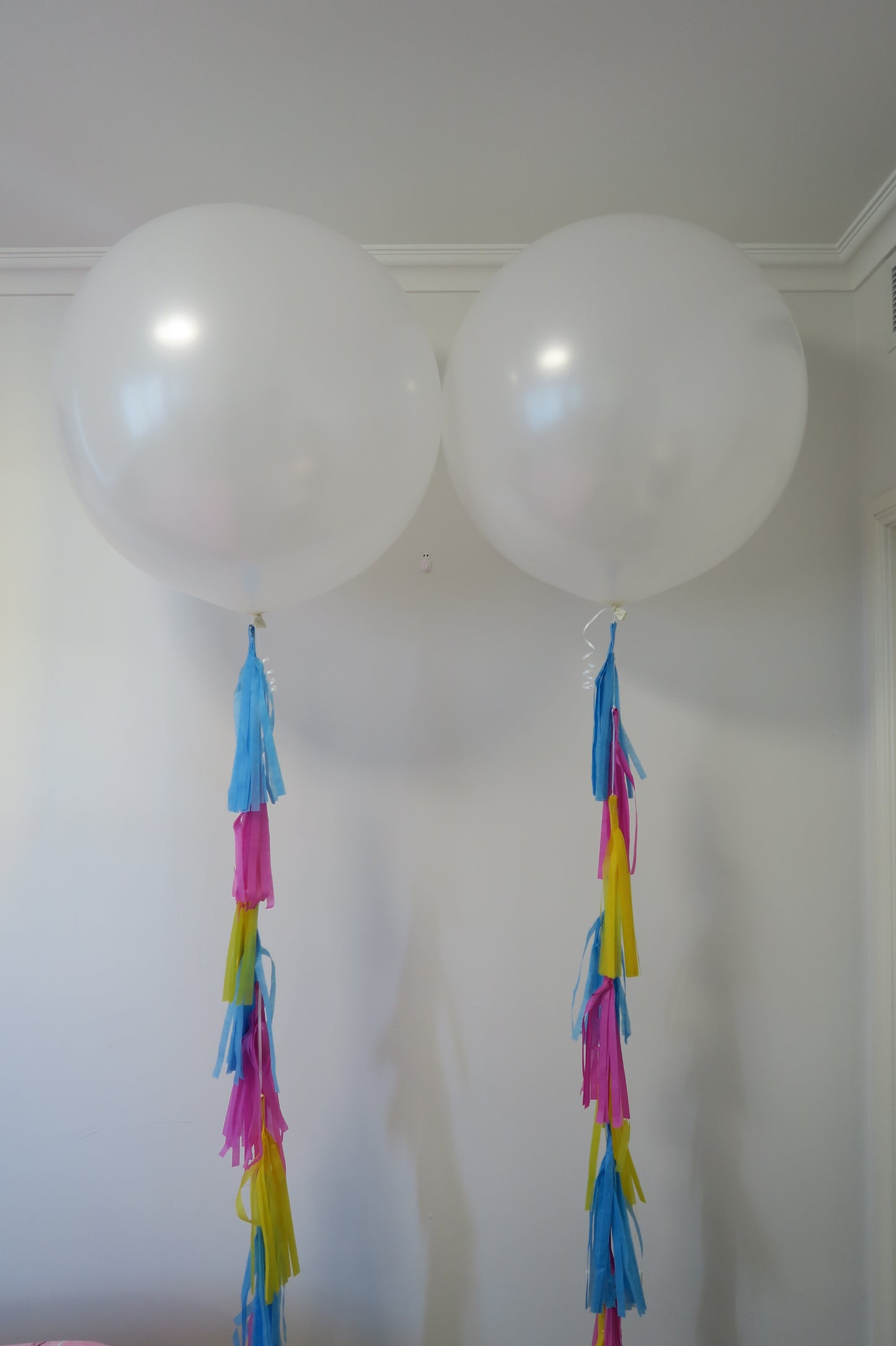 2 of 3ft white round balloon and tassel